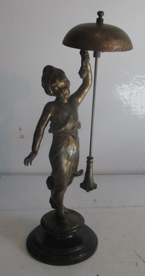 antique Victorian hotel bell with lady