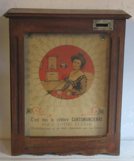 antique money automaton fortune teller