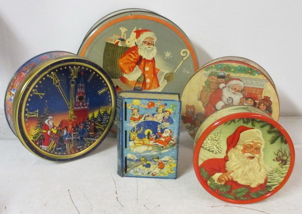 antique biscuits tins with santas
