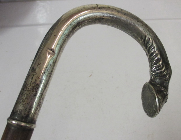 antique solid silver walking stick with horse shoe